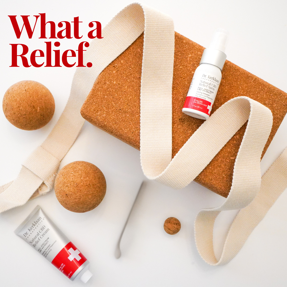 Dr. Kerklaan Natural CBD Relief Cream and Relief Spray displayed with yoga props, including a cork block, strap, and massage balls, perfect for active recovery and relaxation.