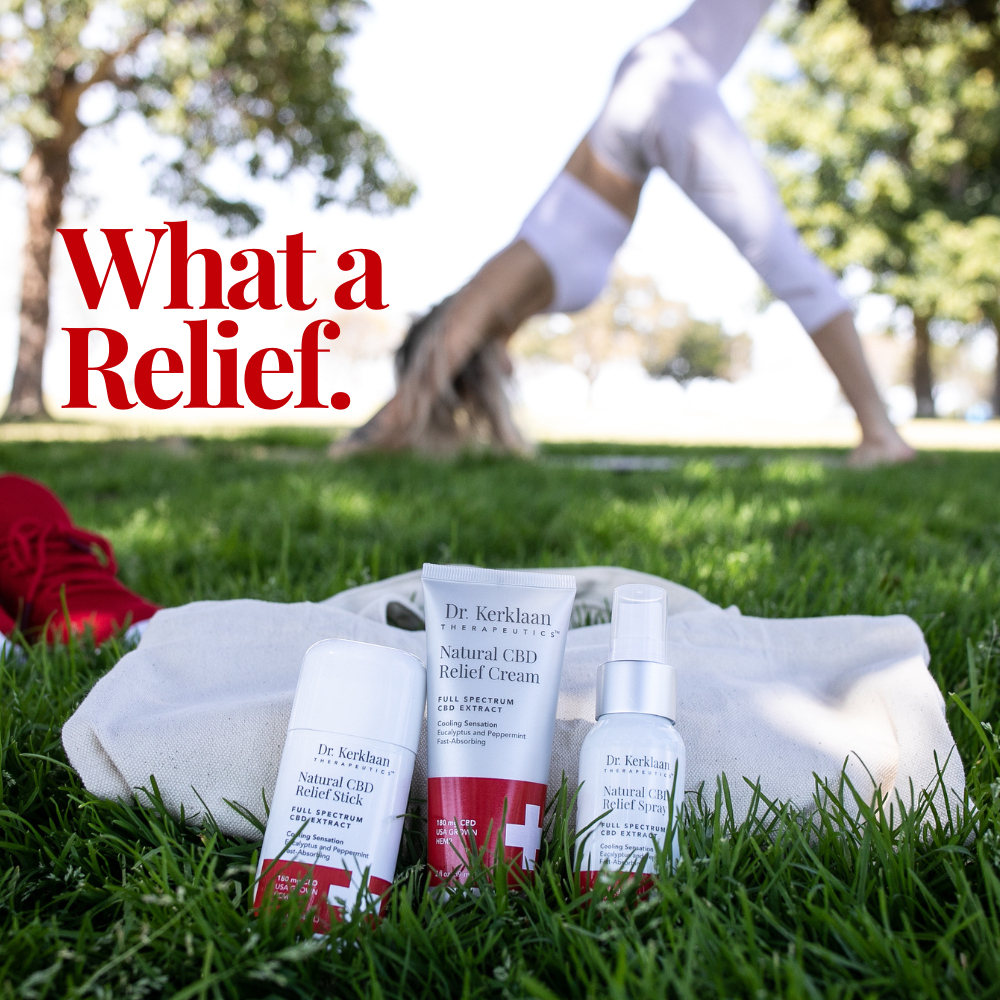 Dr. Kerklaan Natural CBD Relief Kit outdoors on grass with a yoga practitioner in the background, emphasizing active recovery and wellness.