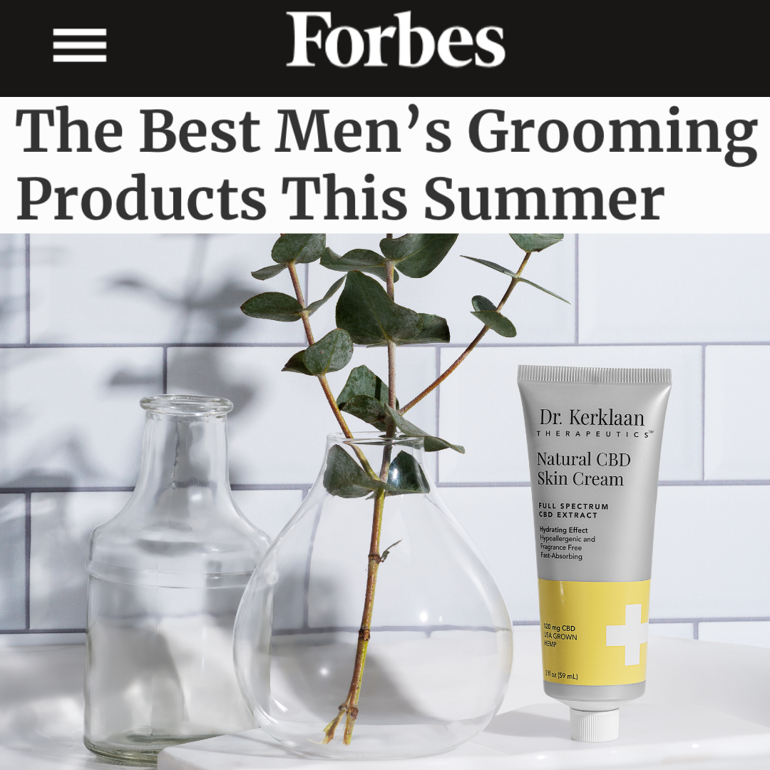 Tube of Dr. Kerklaan Natural CBD Skin Cream next to a glass vase, featured in Forbes as one of the best men’s grooming products for summer.